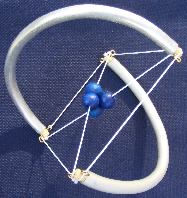 File:2 strut curved with nucleus tetra square helix.jpg